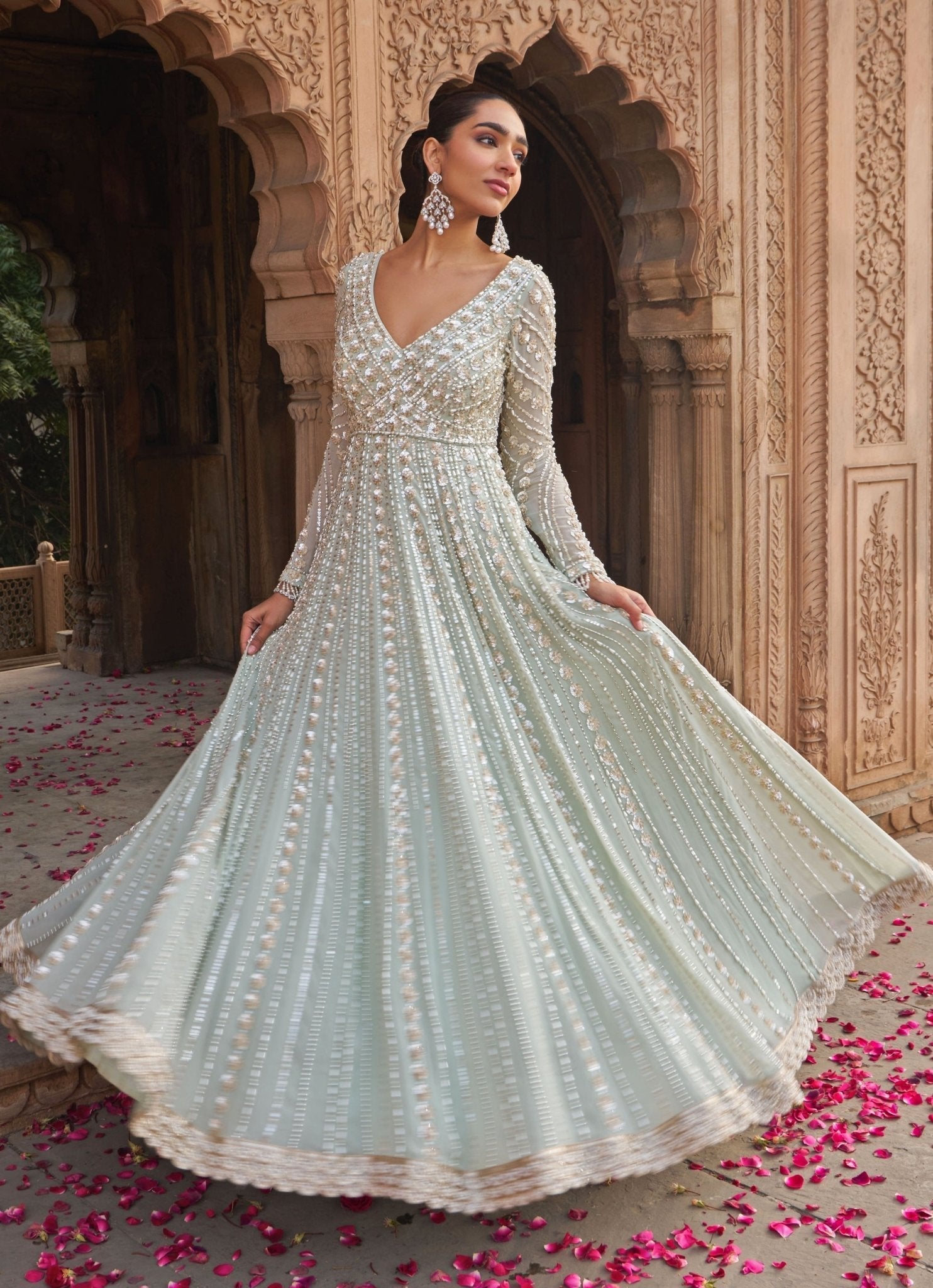 Sage green sequin and pearl embroidered wedding guest anarkali by Nidhika Shekhar