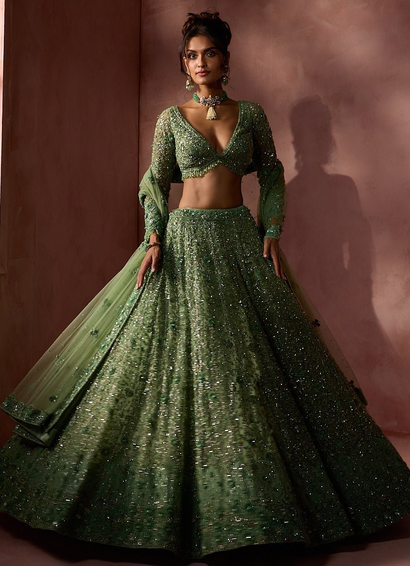 Sage green soft net modern lehenga by Nitika Gujral
