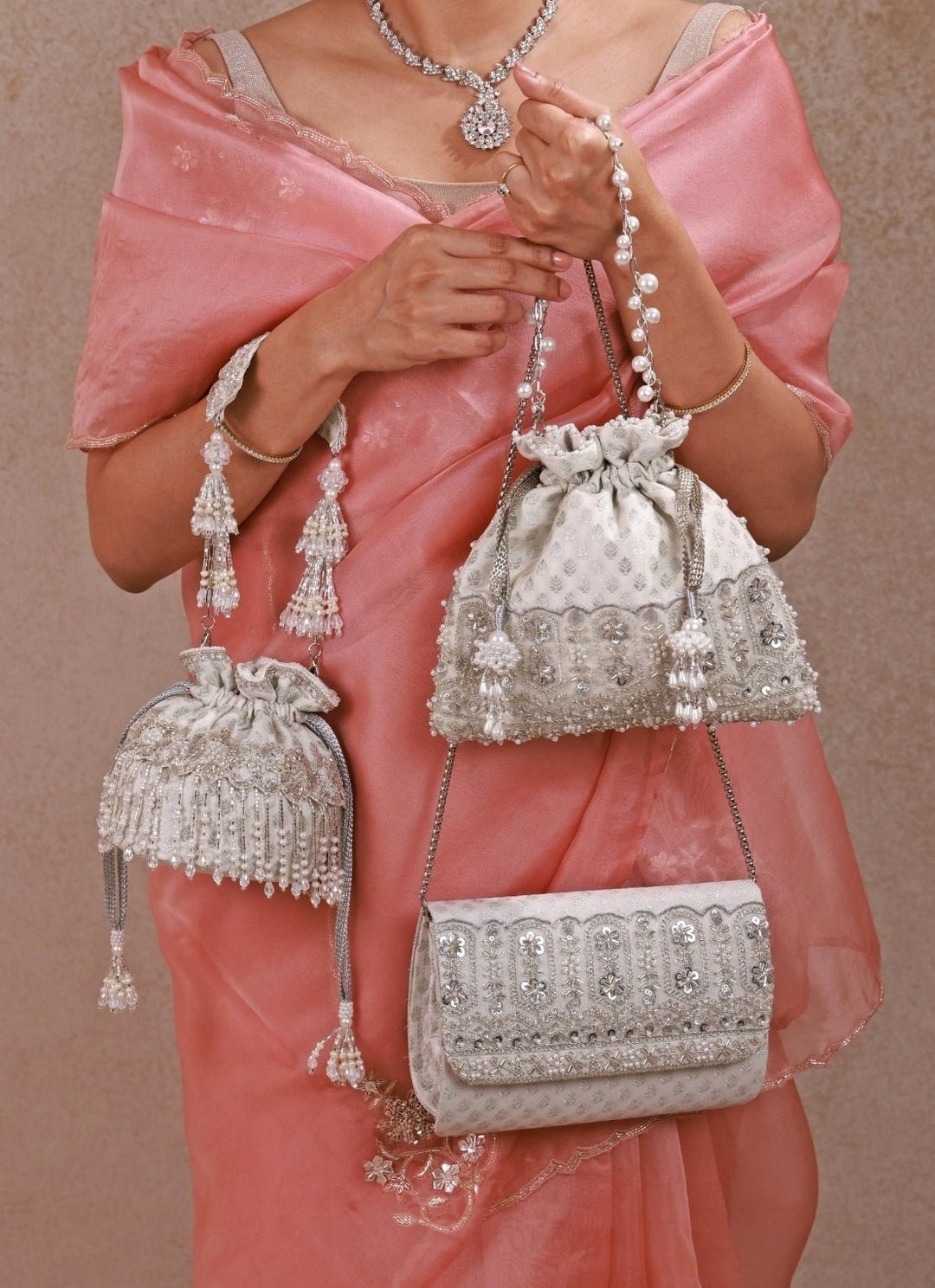 Amyra Silver Pearl Brocade Silk Mini PotliFabilicious Fashion