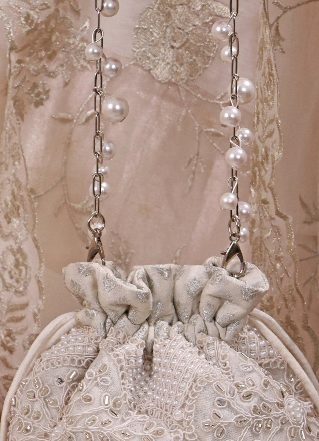 Amyra Silver Pearl Embroidered Silk Mini PotliFabilicious Fashion