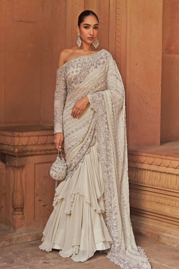 Silver sequin foil georgette lehenga saree with off-shoulder blouse by Nidhika Shekhar