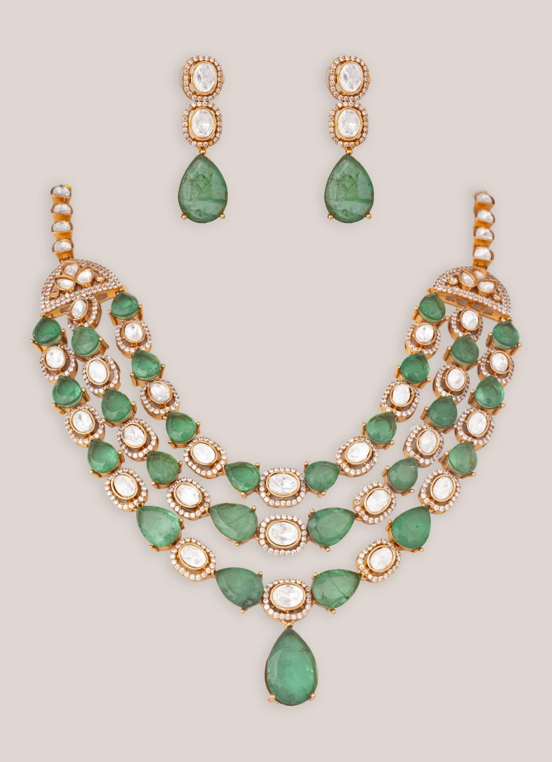 Zevar by Geeta Three Layer Dual Tone Polki Necklace Set With Green StonesFabilicious Fashion