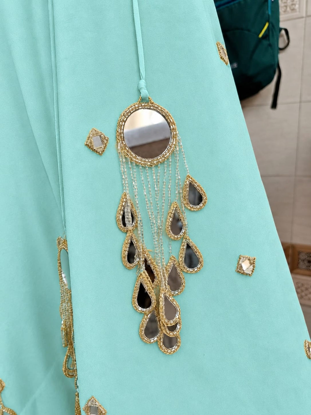 Anisha Shetty Tiffany Blue and Muted Gold Organza Lehenga with Mirror BlouseFabilicious Fashion