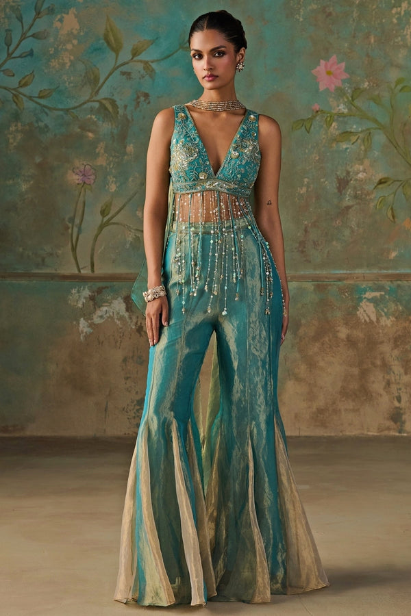 Turquoise blue silk tissue blouse sharara set by Zoon Tribe for a wedding reception