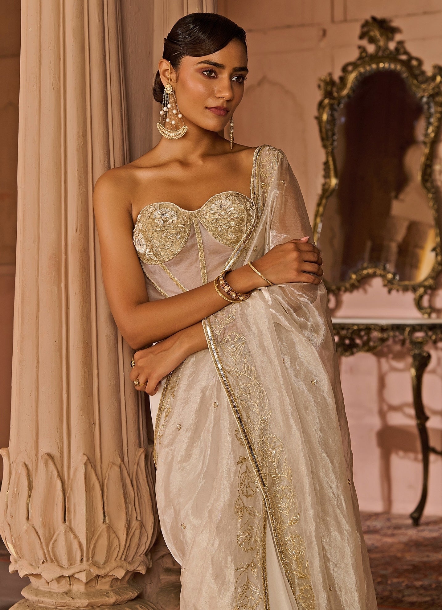 White embroidered organza pre-draped saree with corset blouse for engagement wedding guest