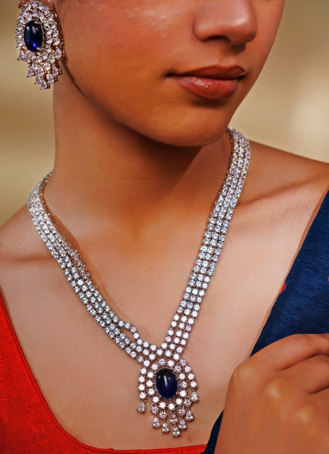 White Finish Diamond And Blue Pendant Necklace Set Zevar by Geeta - Fabilicious Fashion
