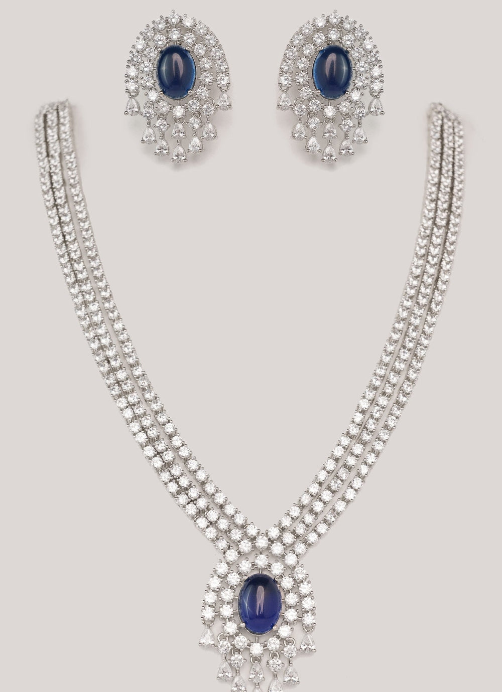 White Finish Diamond And Blue Pendant Necklace Set Zevar by Geeta - Fabilicious Fashion