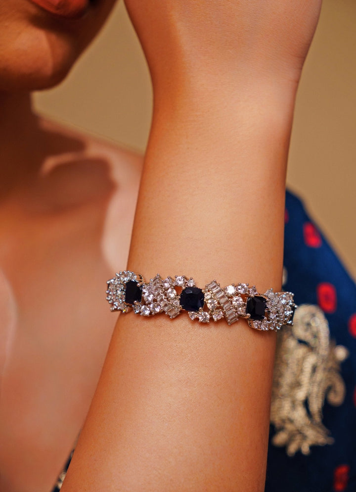 White Finish Diamond And Blue Stone Bracelet Zevar by Geeta - Fabilicious Fashion