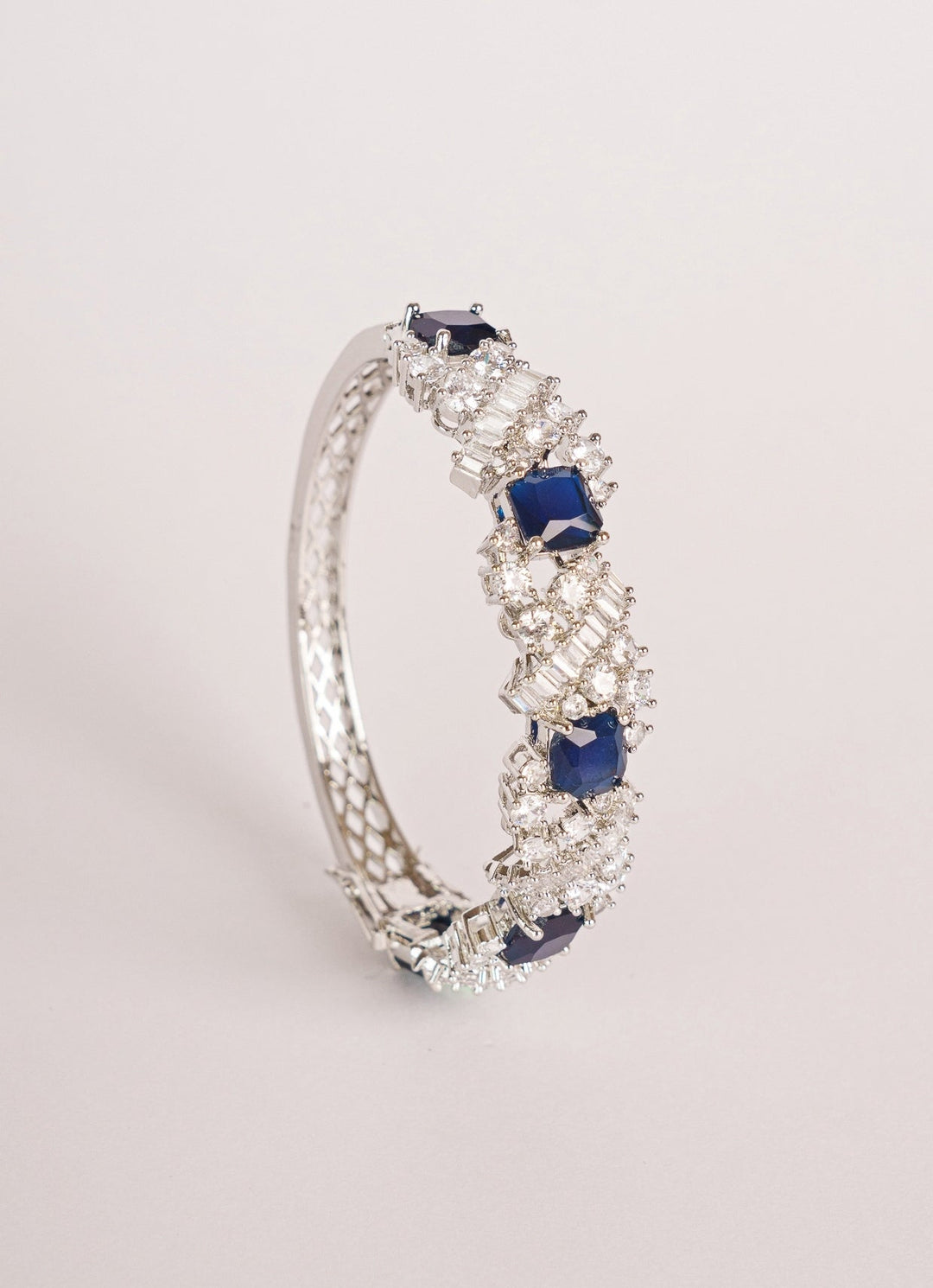 White Finish Diamond And Blue Stone Bracelet Zevar by Geeta - Fabilicious Fashion