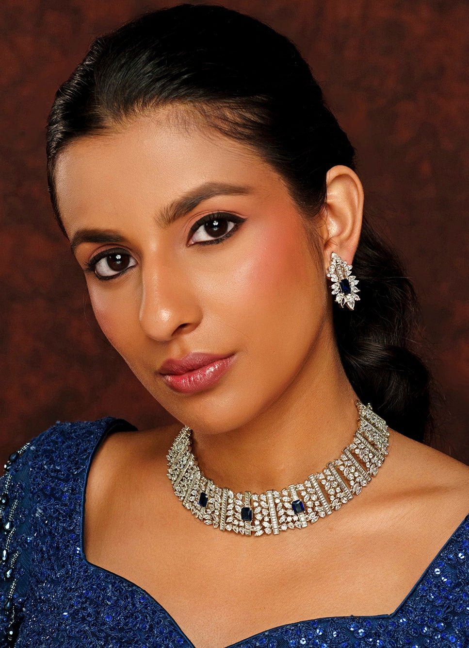 White diamond and blue stone choker for an ivory lehenga