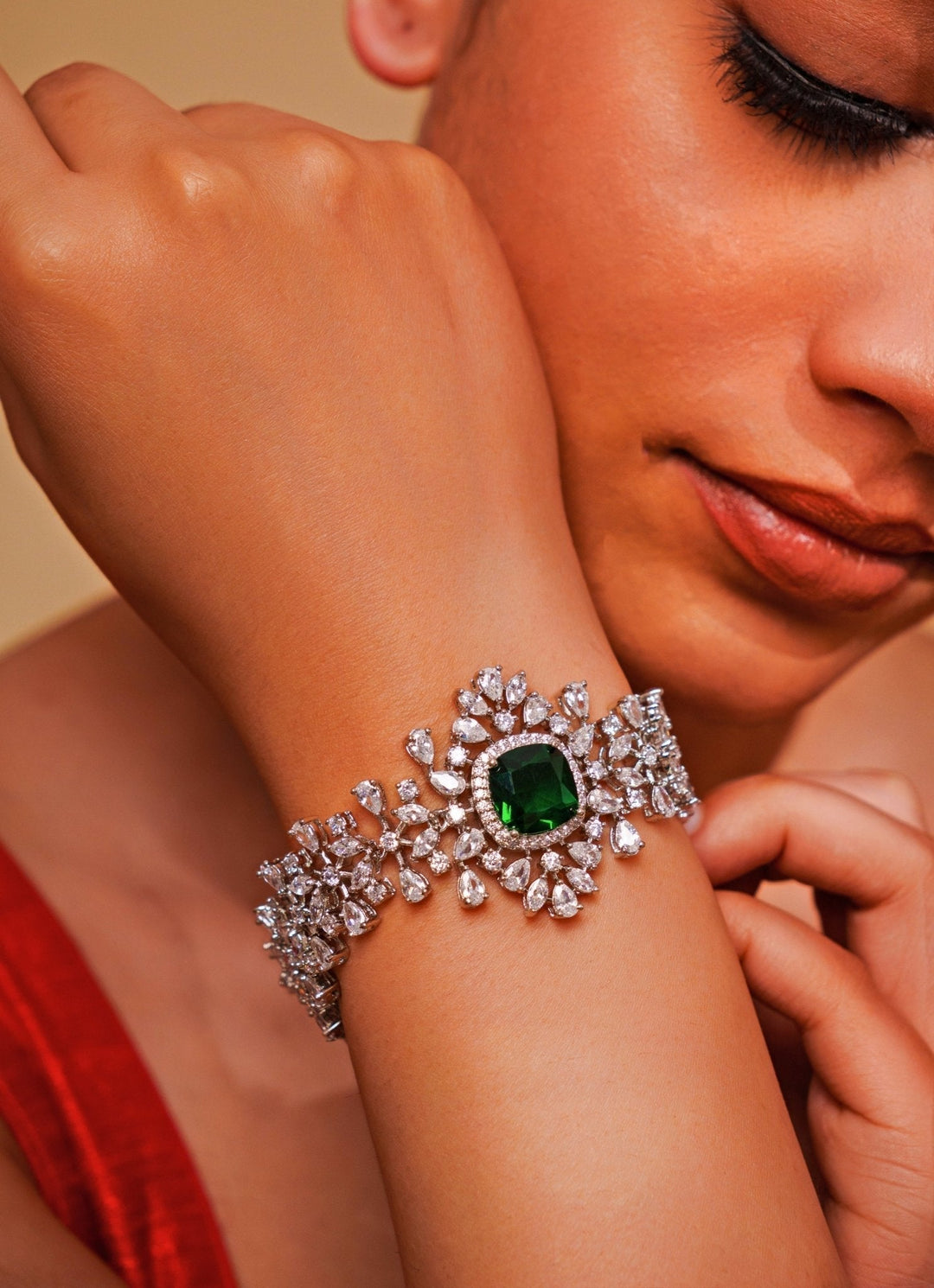 White Finish Diamond And Emerald Green Bracelet Zevar by Geeta - Fabilicious Fashion
