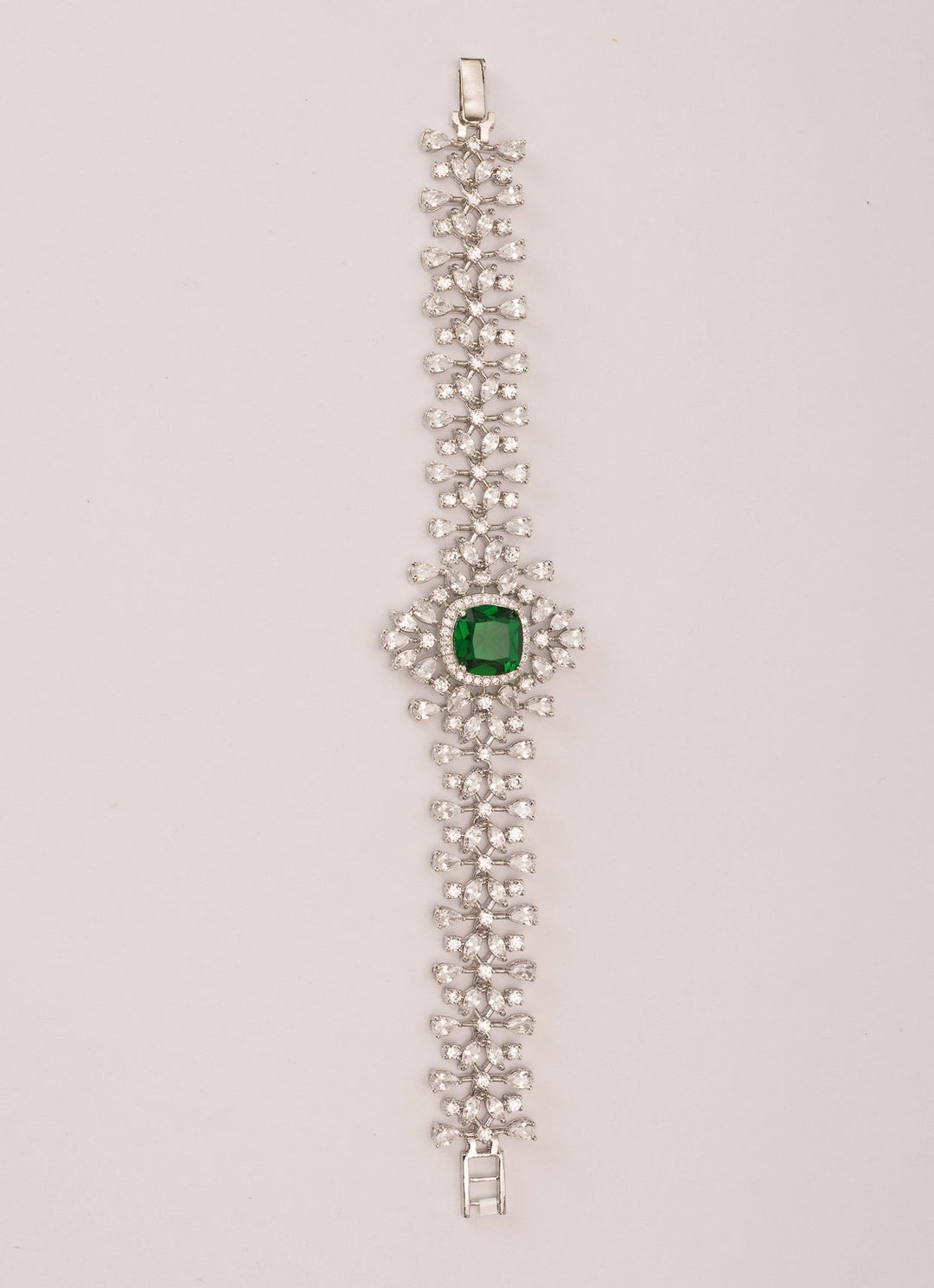 White Finish Diamond And Emerald Green Bracelet Zevar by Geeta - Fabilicious Fashion