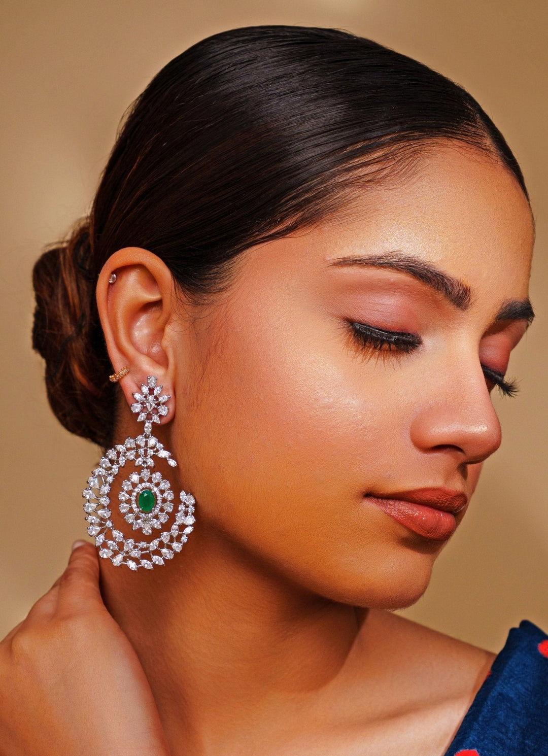 White Finish Diamond And Green Emerald Dangler Earrings Zevar by Geeta - Fabilicious Fashion