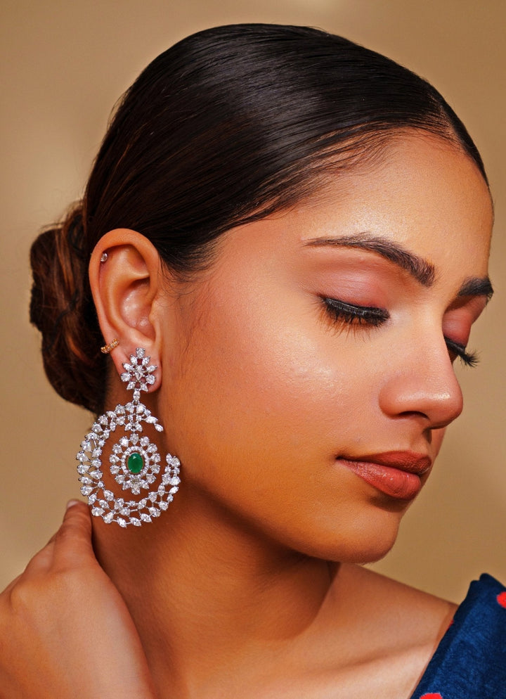 White Finish Diamond And Green Emerald Dangler Earrings Zevar by Geeta - Fabilicious Fashion