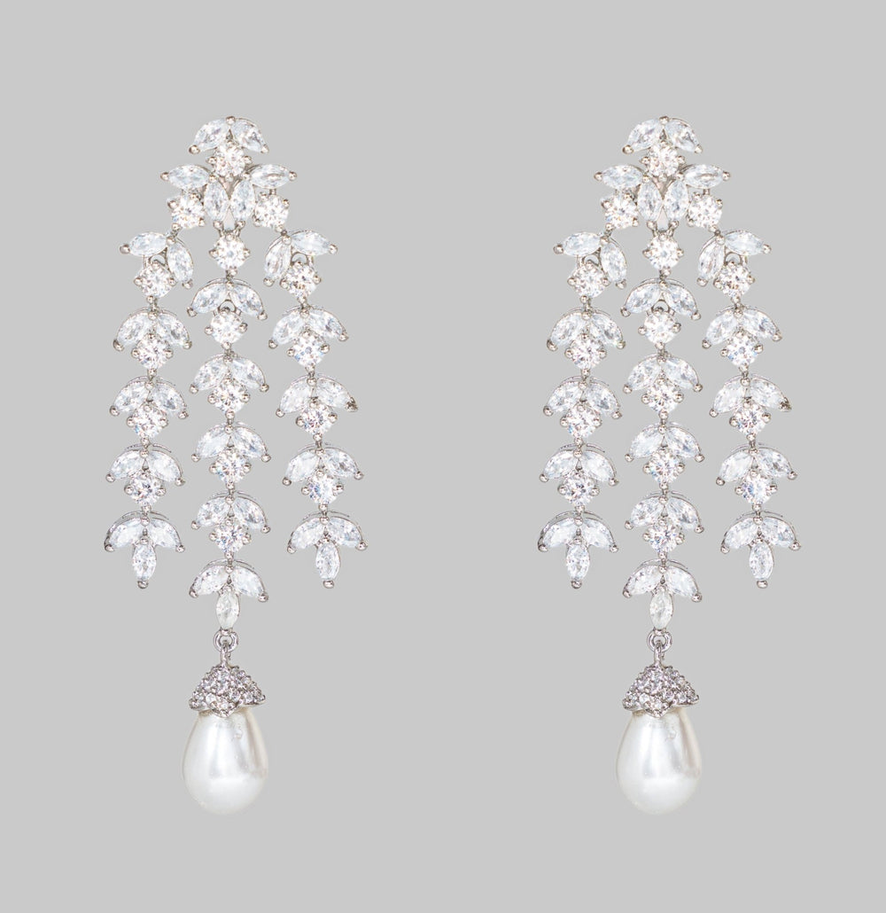 White Finish Diamond And Pearl Drop Dangler Earrings Zevar By Geeta - Fabilicious Fashion