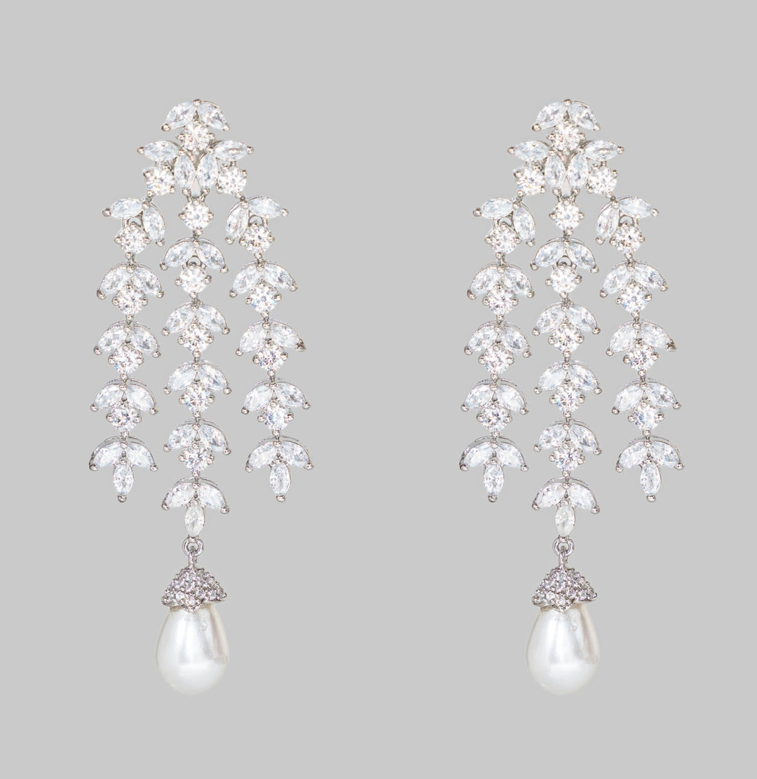 White Finish Diamond And Pearl Drop Dangler Earrings Zevar By Geeta - Fabilicious Fashion