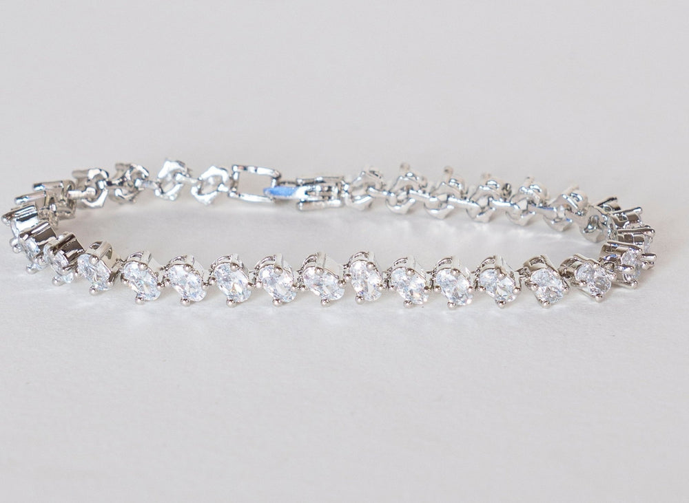 White Finish Diamond Bracelet Zevar By Geeta - Fabilicious Fashion