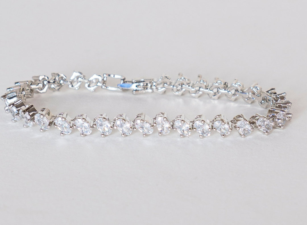 White Finish Diamond Bracelet Zevar By Geeta - Fabilicious Fashion