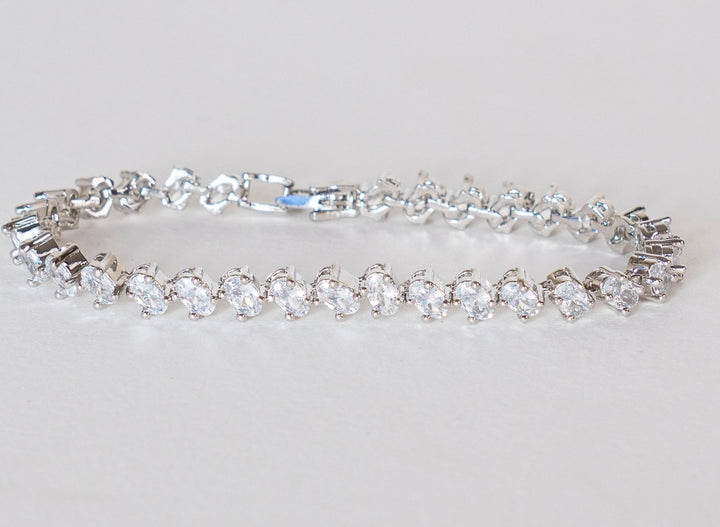 White Finish Diamond Bracelet Zevar By Geeta - Fabilicious Fashion