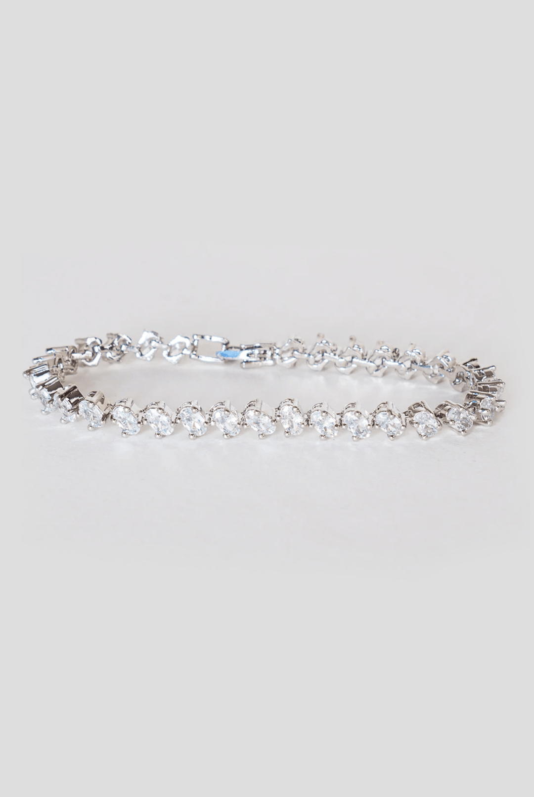 White Finish Diamond Bracelet Zevar By Geeta - Fabilicious Fashion