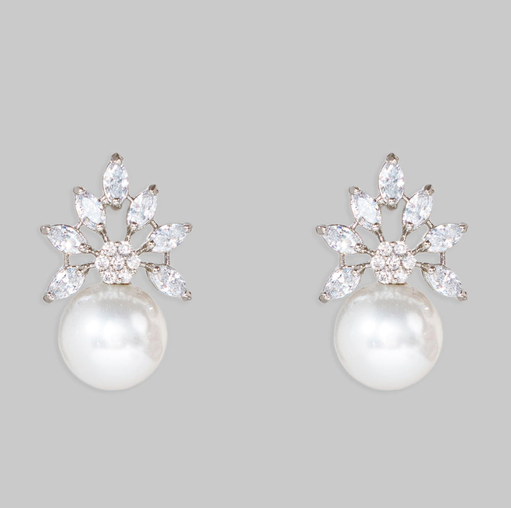 White Finish Pearl Stud Earrings Zevar By Geeta - Fabilicious Fashion