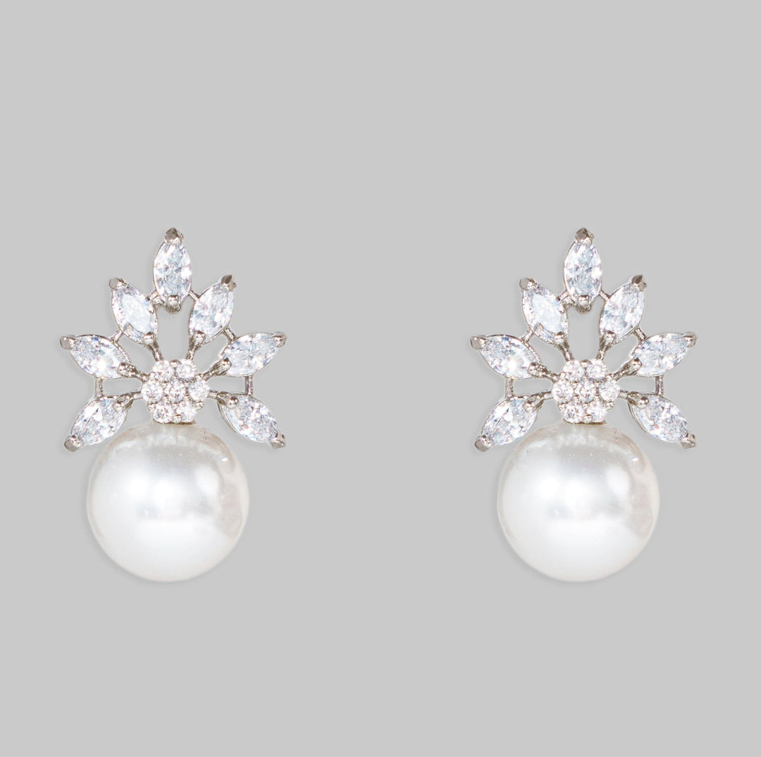 White Finish Pearl Stud Earrings Zevar By Geeta - Fabilicious Fashion