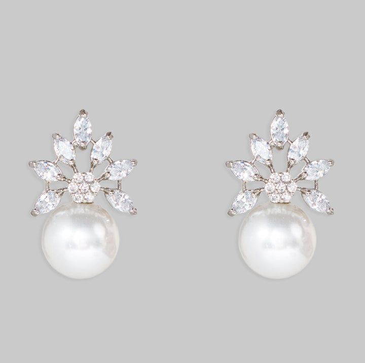 White Finish Pearl Stud Earrings Zevar By Geeta - Fabilicious Fashion