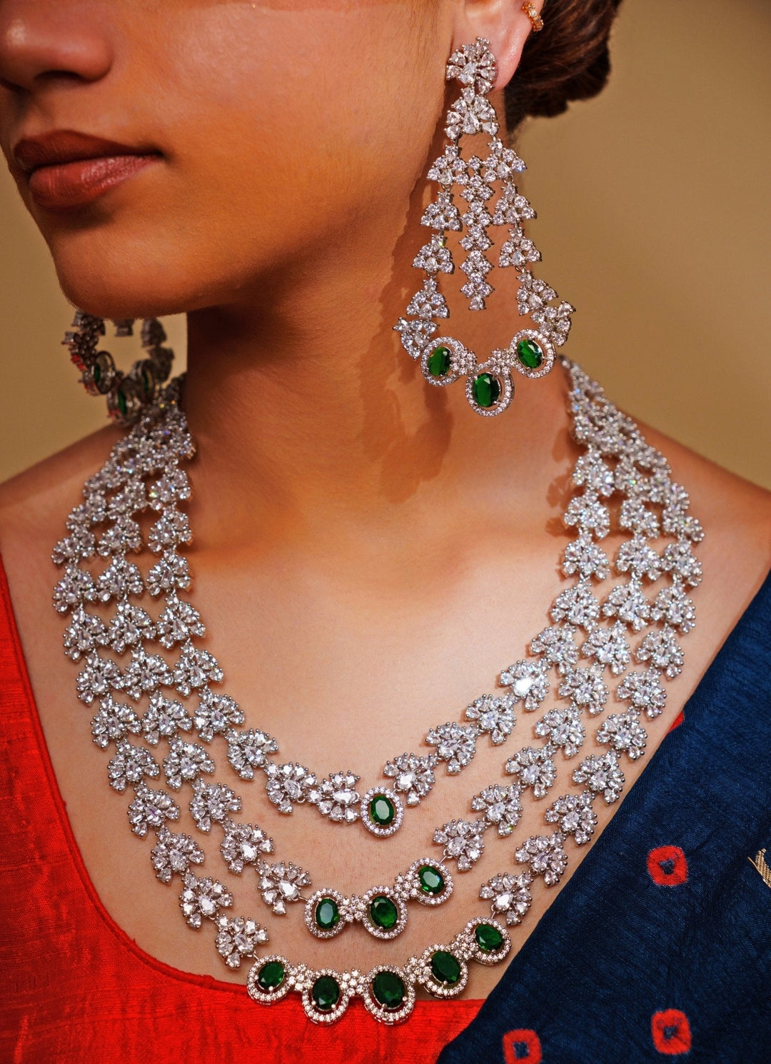 White Finish Three Layered Diamond And Green Necklace Set Zevar by Geeta - Fabilicious Fashion