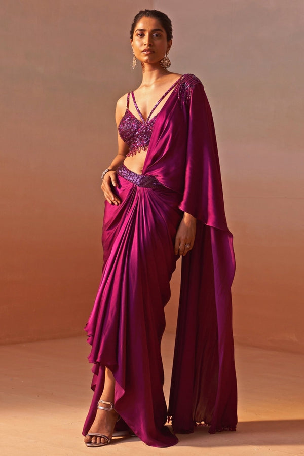 Wine satin pre-draped saree by Nitika Gujral