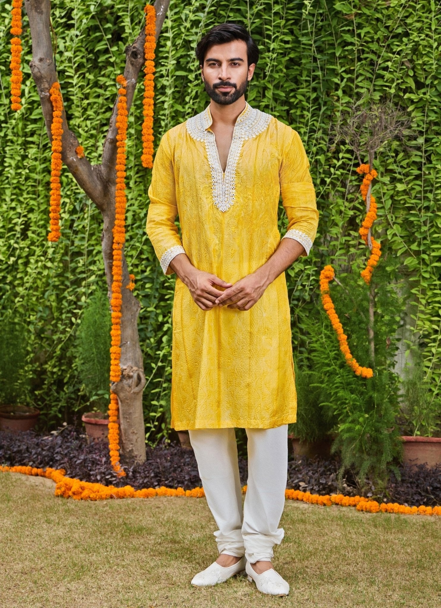 Yellow and ivory silk kurta set, sherwani style, by Nitika Gujral Men