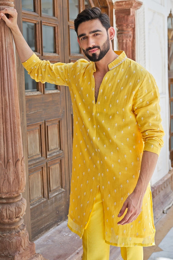 Yellow cotton chanderi kurta set for men for a haldi ceremony by Darzi House