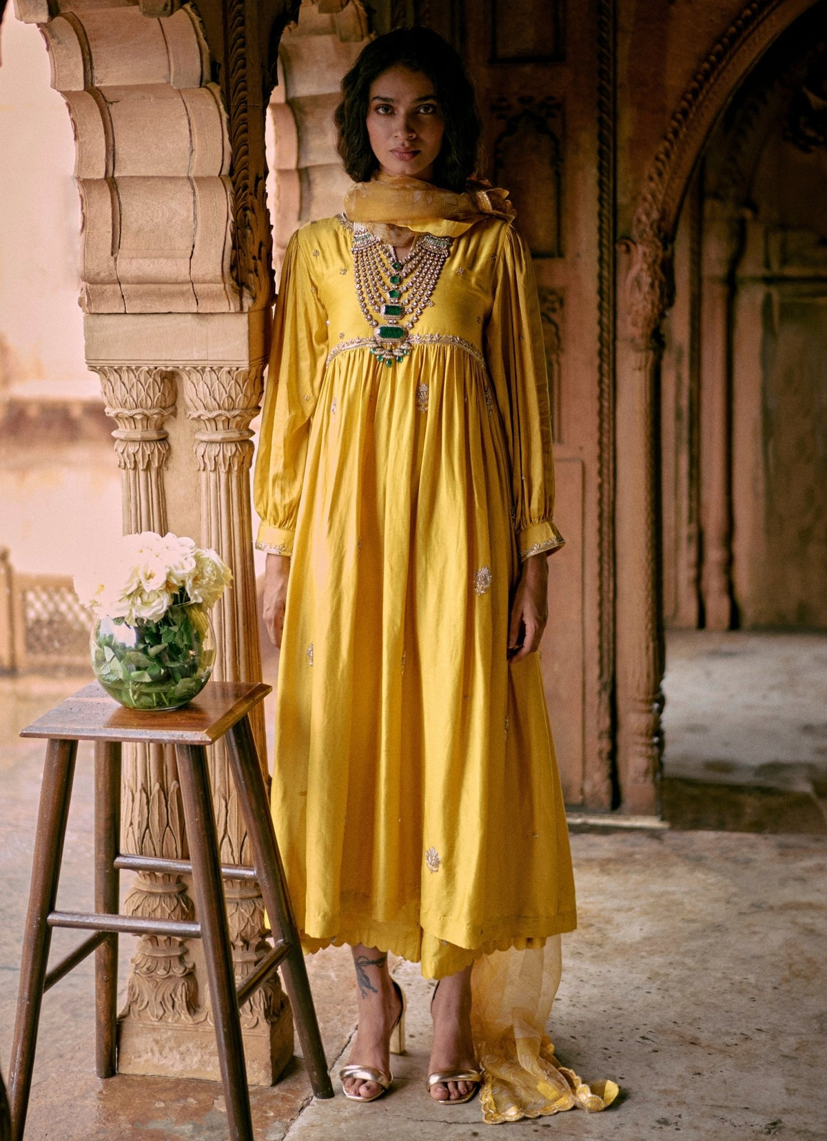 Paulmi and Harsh Yellow Embroidered Modal Silk Anarkali Set for a henna night in Saudi Arabia