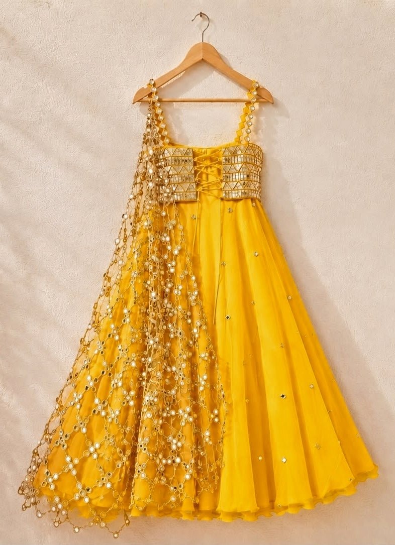 Anisha Shetty Yellow Organza Lehenga Set with Corset BlouseFabilicious Fashion
