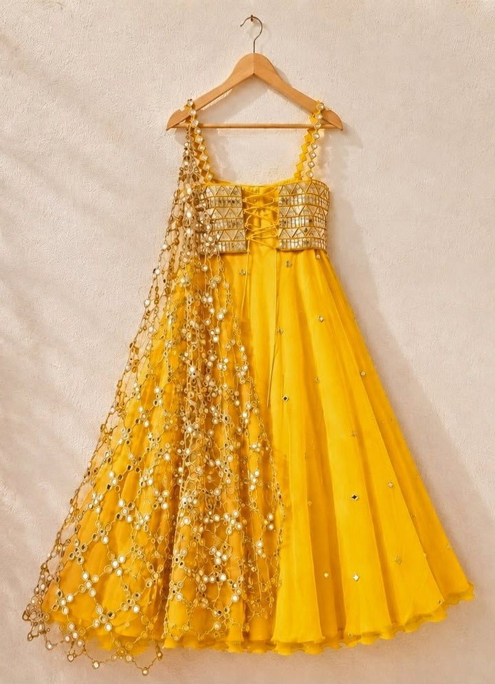 Anisha Shetty Yellow Organza Lehenga Set with Corset BlouseFabilicious Fashion