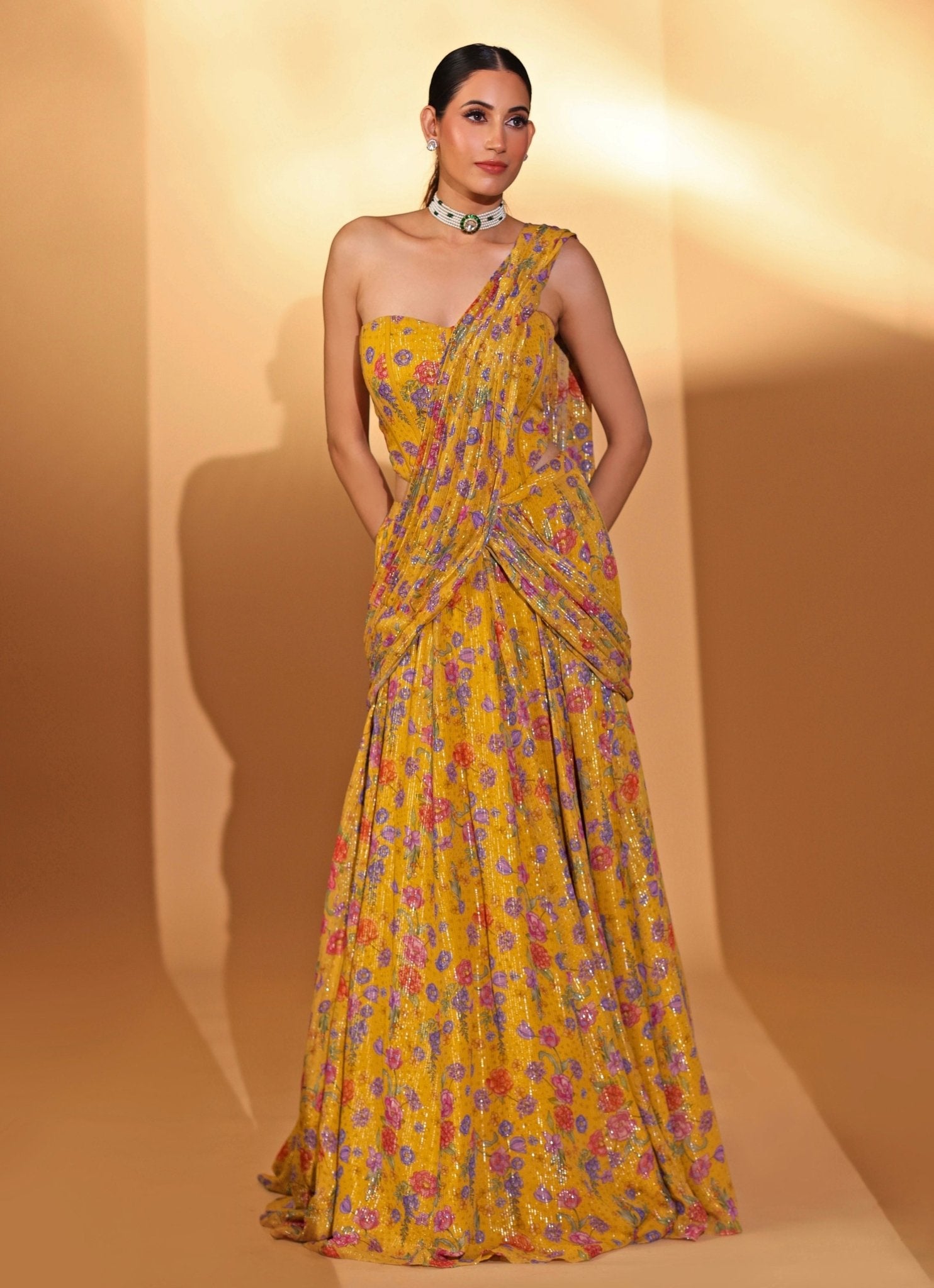 Yellow printed georgette lehenga saree with corset blouse for a daytime function by Kiyohra, made to measure