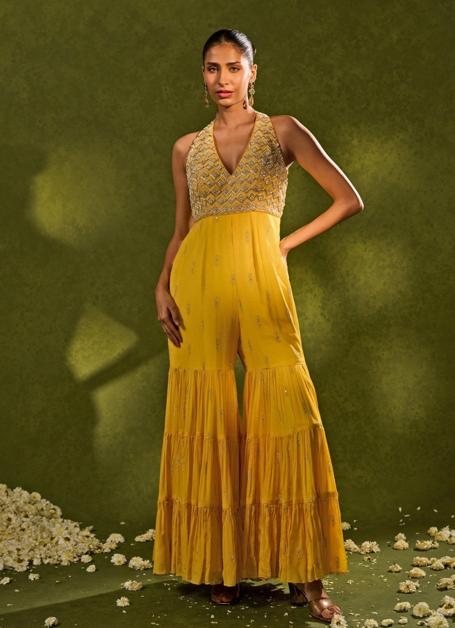 Yellow raw silk indo-western jumpsuit for haldi — bride and guests by Chamee and Palak