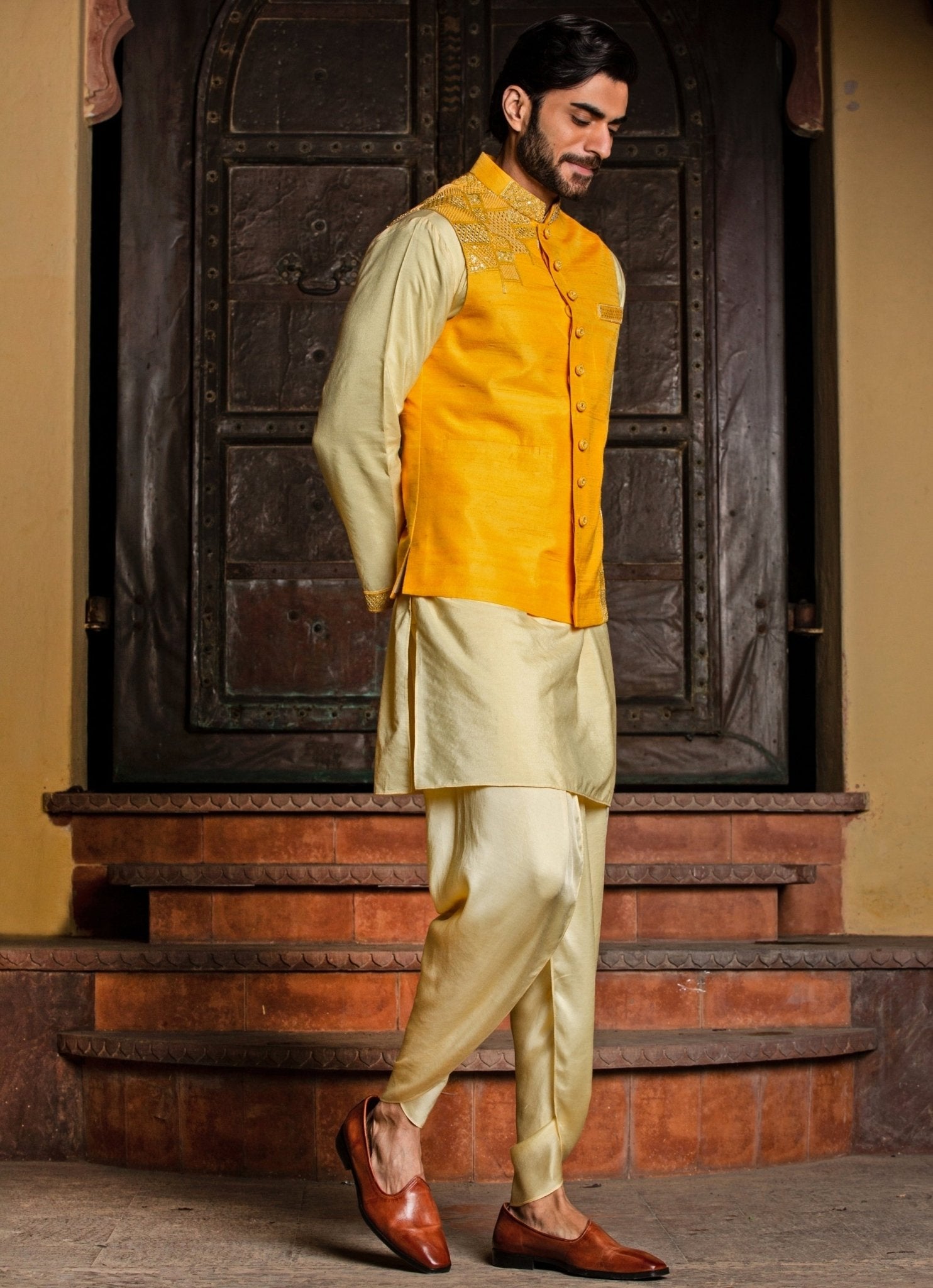 Yellow raw silk nehru jacket with lemon kurta set for daytime Indian wedding dressing