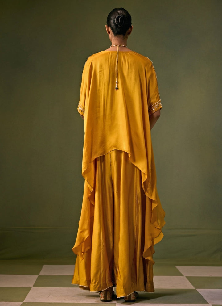 Prahnaaya Yellow Satin Flared Pants Set With Asymmetric TopFabilicious Fashion
