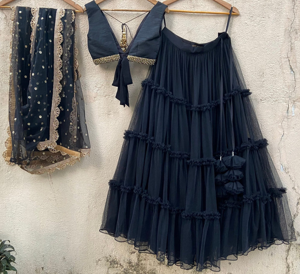 Black tiered lehenga set with raw silk blouse and dupatta Priti Sahni - Fabilicious Fashion