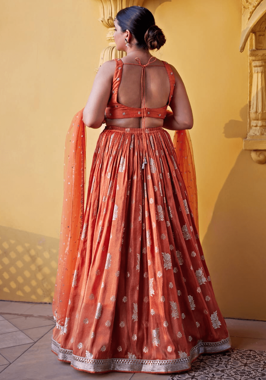 Chamee and Palak Burnt Orange Embroidered Lehenga SetFabilicious Fashion