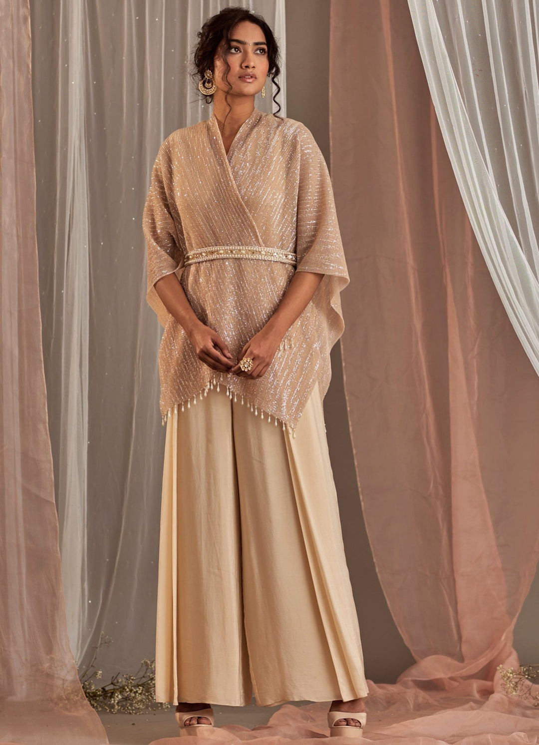 Champagne Crepe Jumpsuit With Cape And Belt Nidhika Shekhar - Fabilicious Fashion