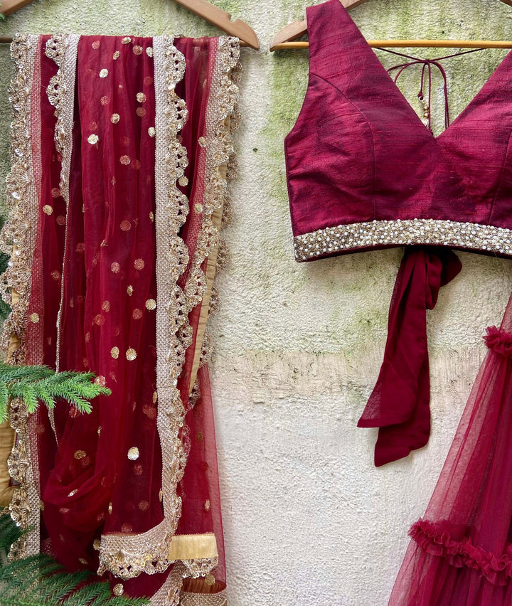 Crimson Red tiered lehenga set with raw silk blouse and dupatta Priti Sahni - Fabilicious Fashion