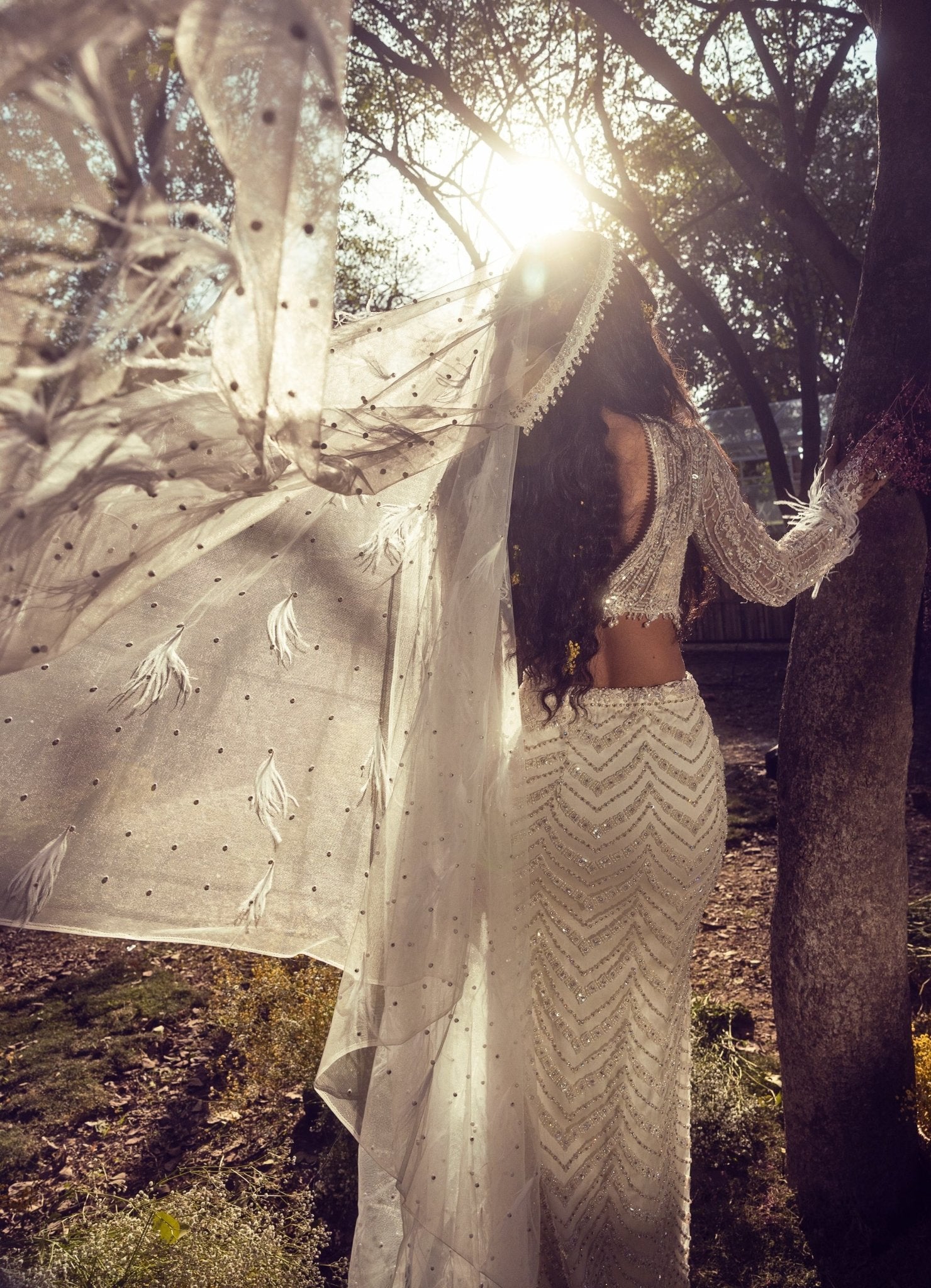 Ivory mermaid lehenga silhouette with structured corset bodice