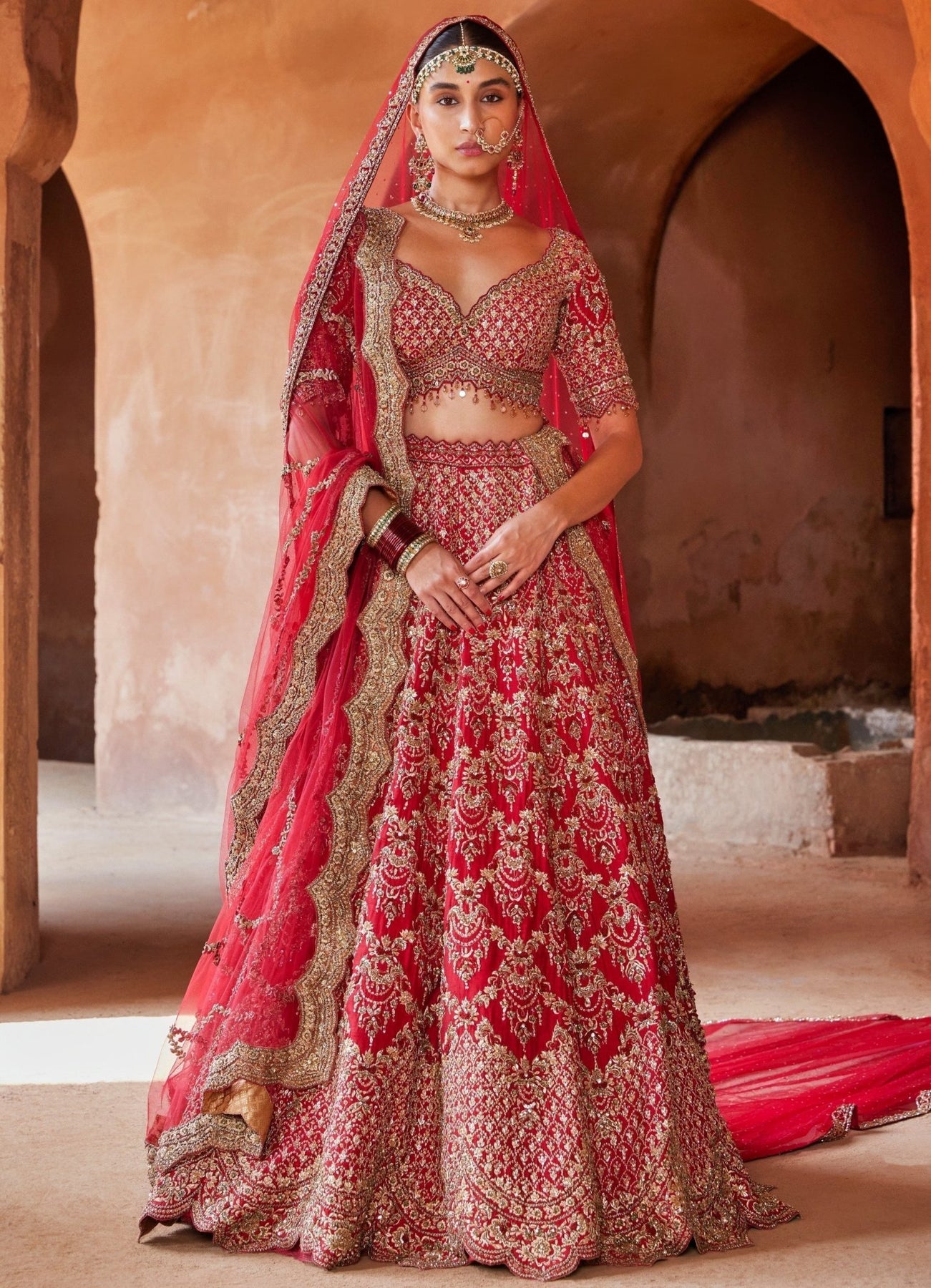 Hot Red Bridal Lehenga Set With Net Veil Nitika Gujral