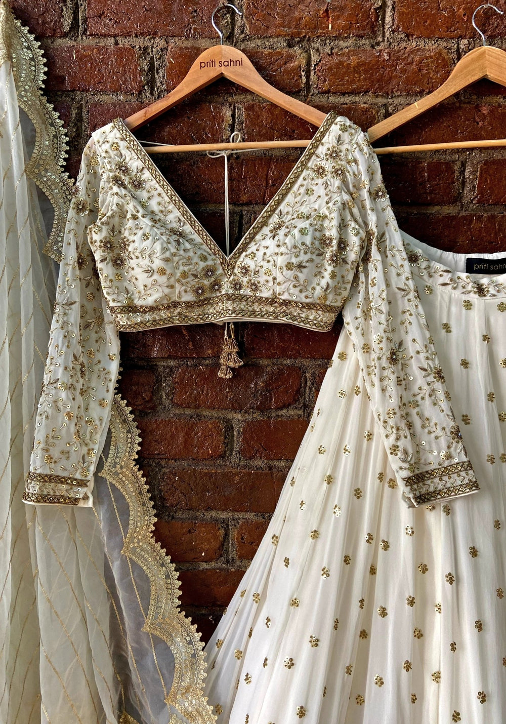 Ivory And Gold Georgette Lehenga Set Priti Sahni - Fabilicious Fashion