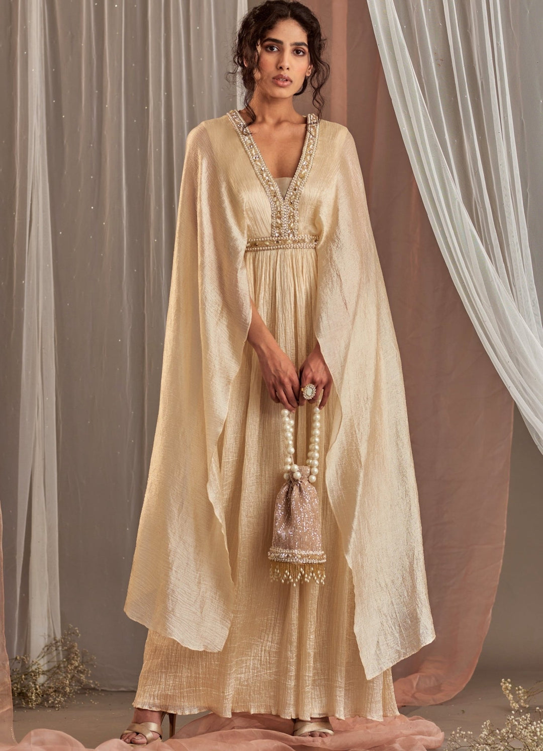 Ivory Draped Silk Gown With Long Flared Sleeves Nidhika Shekhar - Fabilicious Fashion
