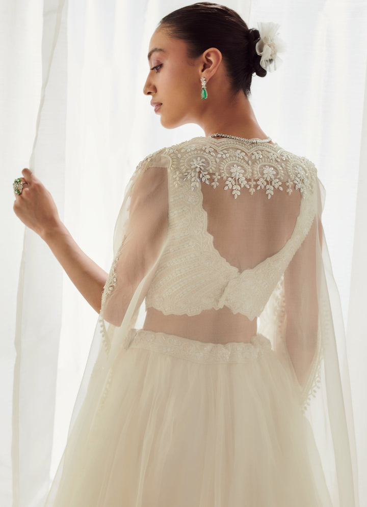 Ivory Embellished Organza Lehenga Set With Cape Suhino - Fabilicious Fashion