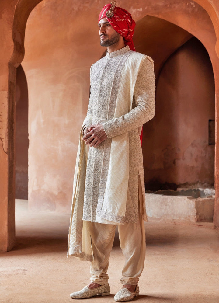 Ivory Embellished Silk Shewani Set With Churidar Pant Nitika Gujral - Men - Fabilicious Fashion
