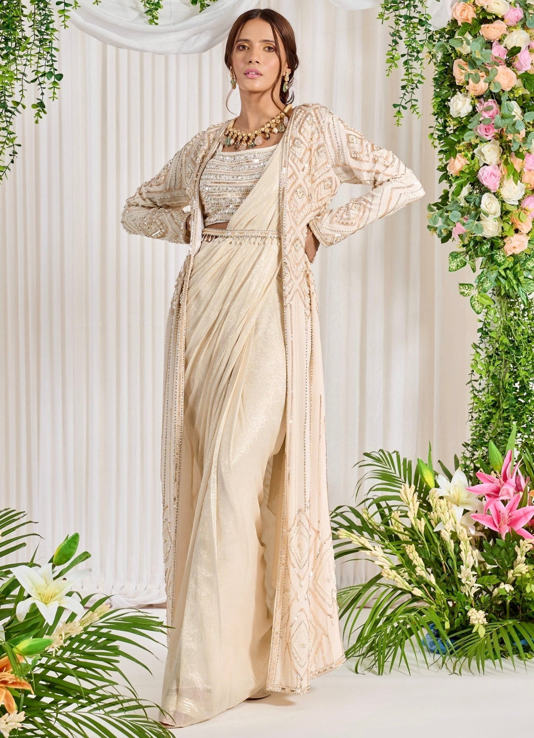 Ivory Georgette Saree With Embellished Blouse & Full Sleeved Cape Nidhika Shekhar - Fabilicious Fashion