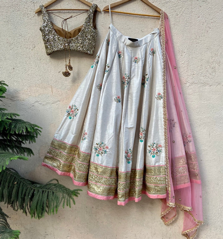 Ivory Raw Silk Lehenga With Floral Embroidery Priti Sahni - Fabilicious Fashion